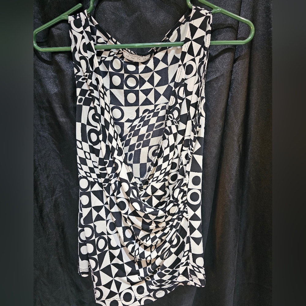Crossed tank. Wear to work, deco style.